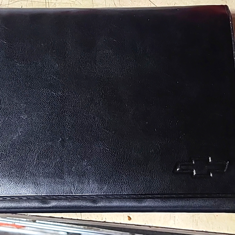 1992 Chevrolet Camaro owners manual with leather case.